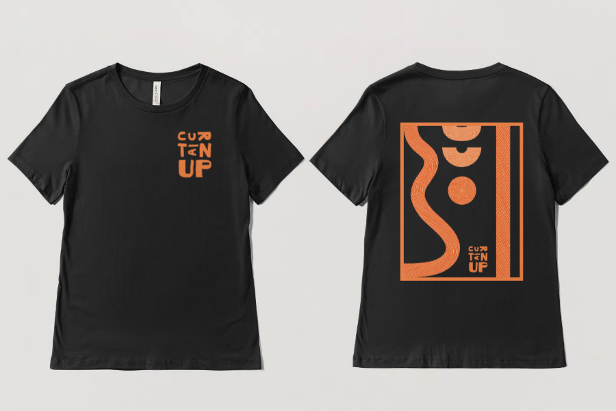 Orange t-shirt with woven line graphics and logo.